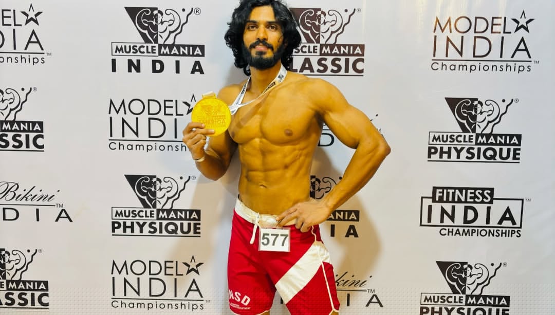 Kedar Kuchekar with his Musclemania medal